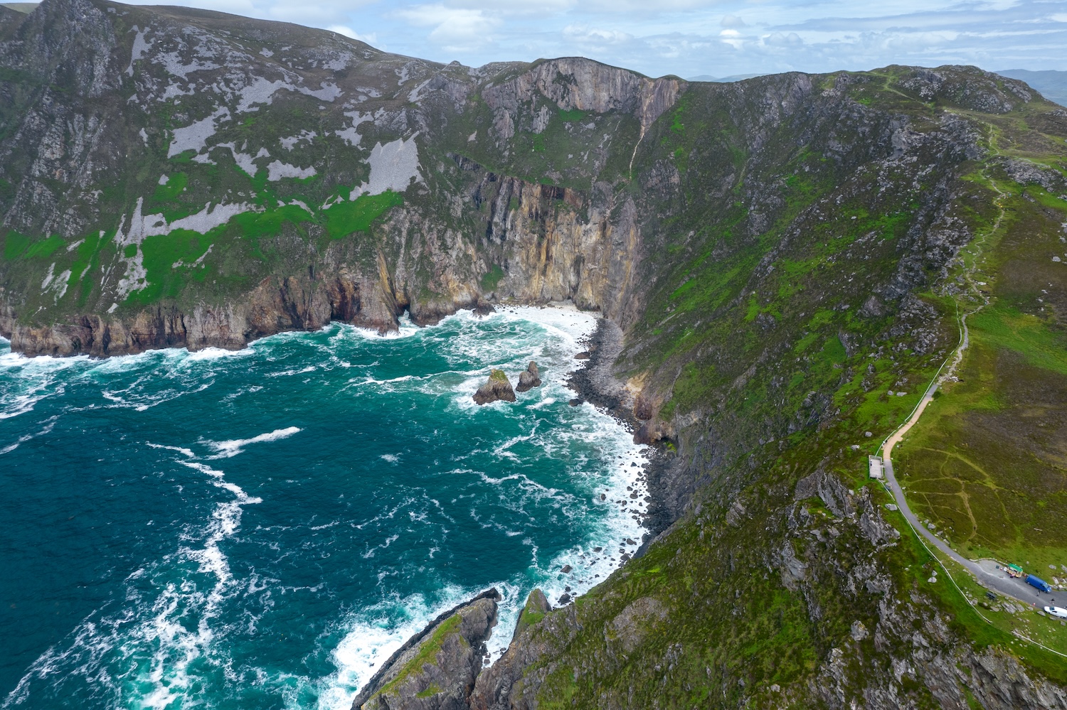 A landscape of the Slieve League surrounded by water in County Donegal, Ireland