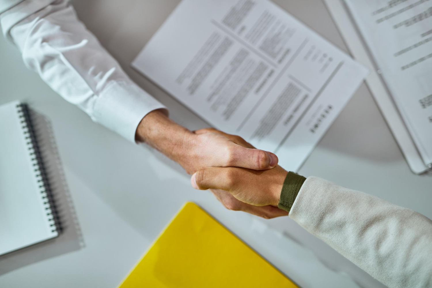 closeup-businessmen-shaking-hands-after-successful-agreement